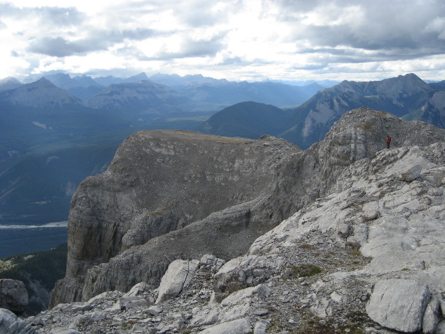 Large mountain, tiny man